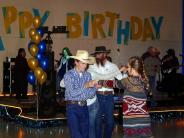 A couple dancing at the Birthday Ball