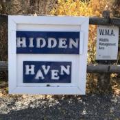 Sign at Parking area for Hidden Haven. 