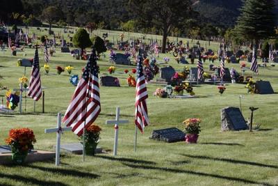 Photo of Parowan Cemetery on Memorial Day with flags and flowers